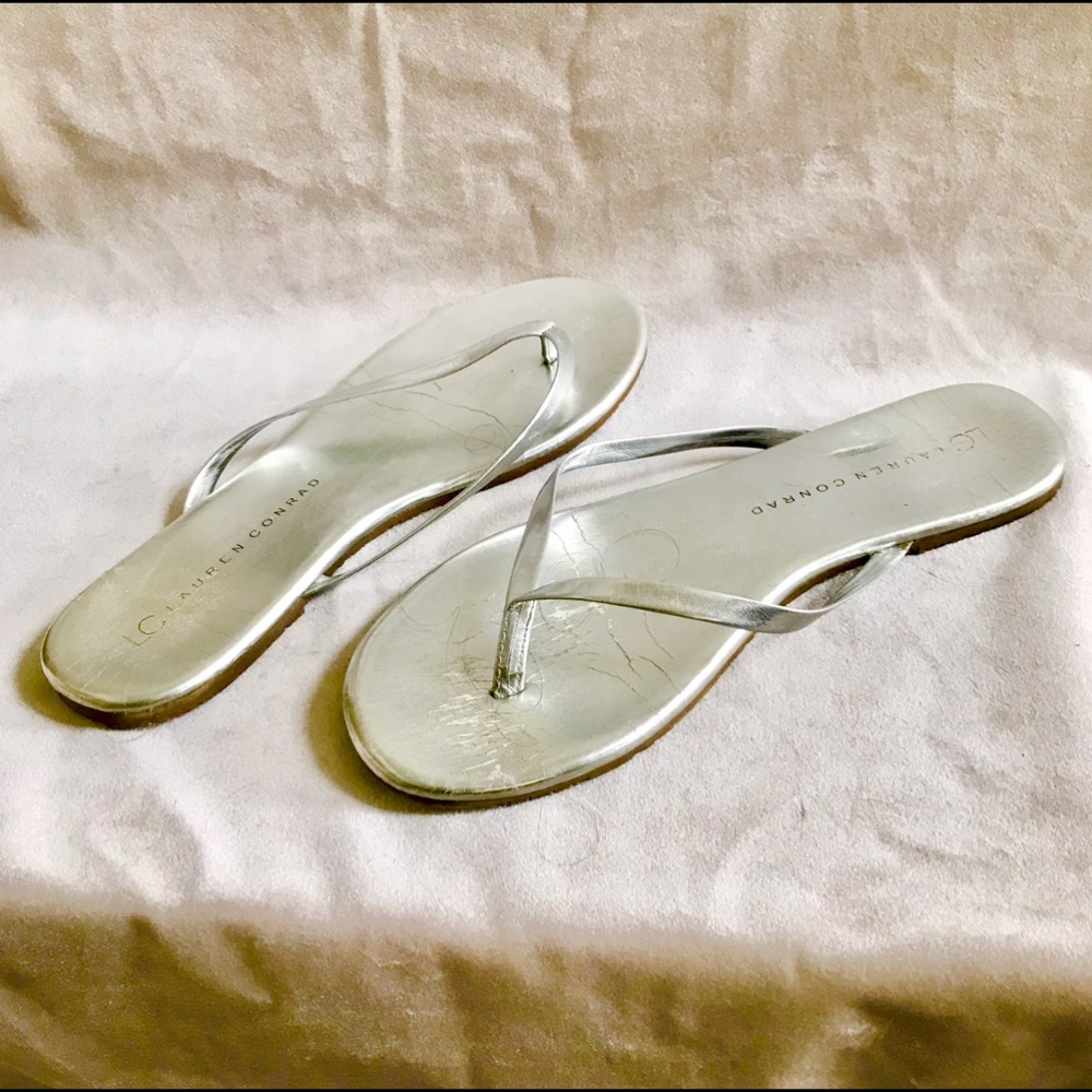 Silver flip flops size 7M